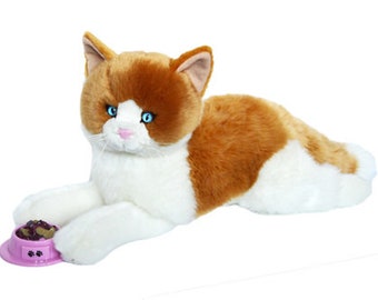 stuffed cat with kittens