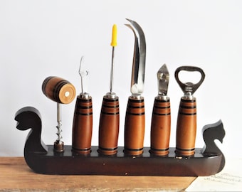 A set of vintage hand openers, a collector's item