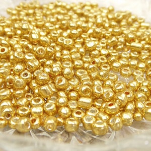 50g 52,00EUR/kg Rocailles metallic 6/0 4mm verschiedene Farben 1467 gold