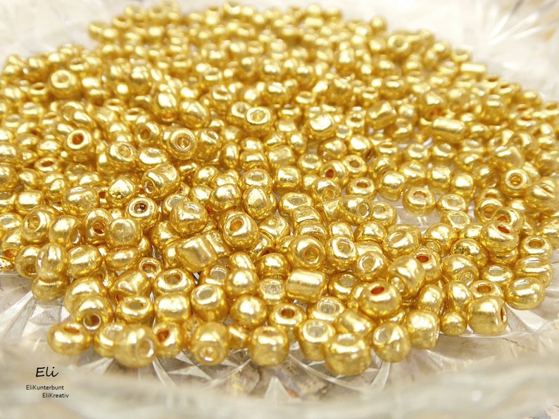 50g 52,00EUR/kg Rocailles metallic 6/0 4mm verschiedene Farben 1467 gold