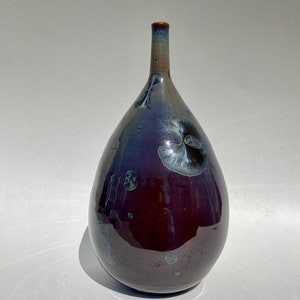 Closed neck burgundy and charcoal grey ceramic piece