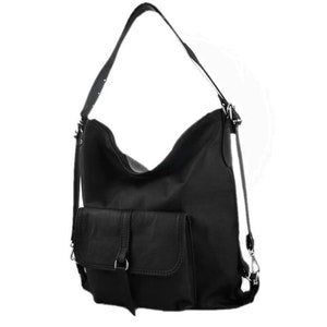 May include: Black leather shoulder bag with a large main compartment and a front pocket. The bag has a long adjustable strap and a shorter handle. The bag can be worn as a shoulder bag or a backpack.