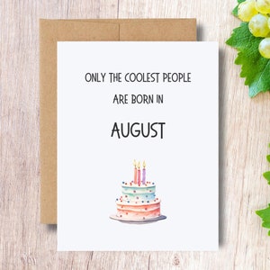 May include: A white card with the text "ONLY THE COOLEST PEOPLE ARE BORN IN AUGUST" and a watercolor illustration of a birthday cake with candles.