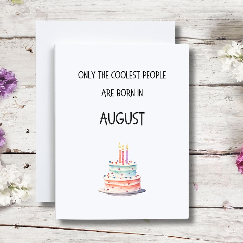 May include: White card with the text "Only the coolest people are born in August" and a watercolor illustration of a three-tiered birthday cake with candles.