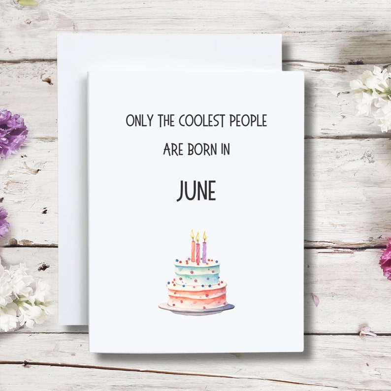 May include: A white card with the text "Only the coolest people are born in June" and a watercolor illustration of a three-tiered birthday cake with candles.