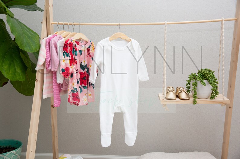 Download Footed Baby Pajamas Mockup on hanger 19 Baby Announcement ...