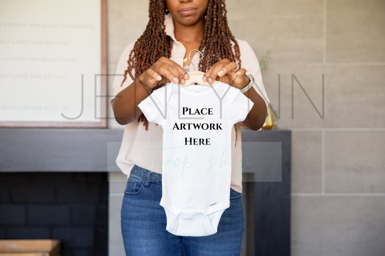Download Black Model holding white onesie TH2 Gerber onesie mockup ...