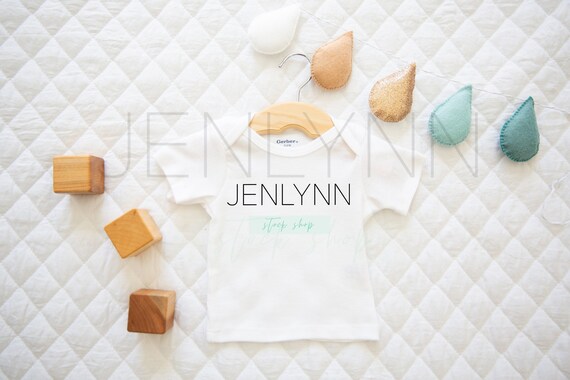 Infant T-shirt Mockup: Gender Neutral Flatlay (JPG)
