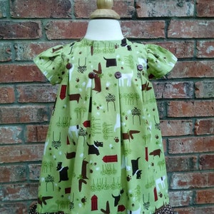 Puppy Dog Print Toddler Dress: Green Ruffle Hem, Button Back