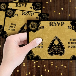Ouija Board Wedding RSVP Enclosure Card Template with planchette detail, perfect for Fall, Halloween, gothic, vintage or witchy weddings. Customize wording, fonts and more. Gold and black, other colors available.
