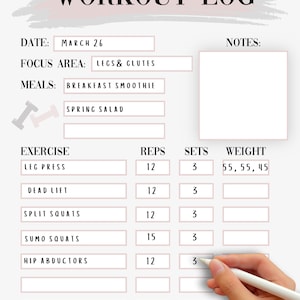 Könnte beinhalten: Ein Trainingstagebuch mit weißem Hintergrund und rosa Akzenten. Das Tagebuch enthält Abschnitte für Datum, Fokusbereich, Mahlzeiten, Übung, Wiederholungen, Sätze und Gewicht. Das Datum ist der 26. März, der Fokusbereich ist Beine und Gesäß, und die Mahlzeiten sind ein Frühstücks-Smoothie und ein Frühlingssalat. Der Übungsbereich listet Beinpresse, Kreuzheben, Split-Squats, Sumo-Squats und Hüftabduktoren auf. Die Wiederholungen, Sätze und das Gewicht sind für die Übung Beinpresse ausgefüllt.
