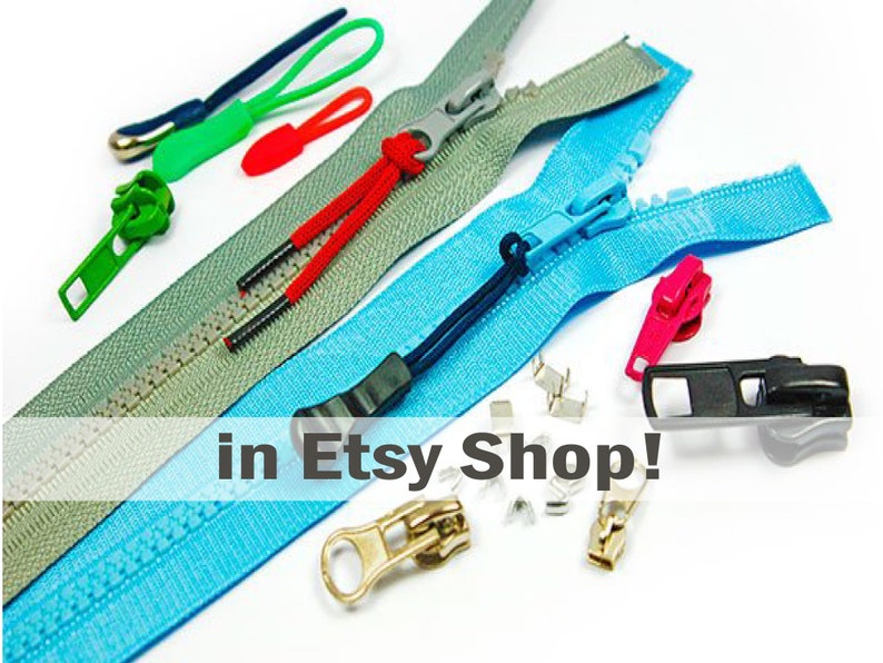 May include: Assortment of zipper pulls and zipper tape in various colors, including green, red, blue, and black. The text "in Etsy Shop!" is visible in the image.