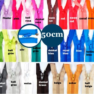 Könnte beinhalten: Eine Auswahl an 50 cm langen Reißverschlüssen in verschiedenen Farben, darunter Schwarz, Weiß, Rot, Blau, Grün, Gelb und Braun. Die Reißverschlüsse sind in Reihen angeordnet und mit ihren Farbnamen auf Deutsch beschriftet.