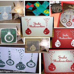 Puede incluir: Un collage de tarjetas y decoraciones navide&ntilde;as. Varias tarjetas presentan dise&ntilde;os de adornos con la frase alemana "Frohe Weihnachten". Otros elementos incluyen una linterna de papel en forma de estrella y un aro de bordado decorativo.