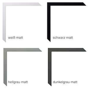 May include: Four samples of picture frames, each showing a different color: white, black, light gray, and dark gray. Each frame is a simple, rectangular shape with a matte finish.