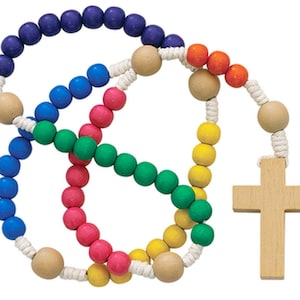May include: A colorful wooden rosary with beads in blue, green, pink, yellow, and orange. The rosary has a wooden cross.