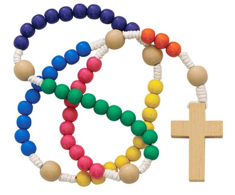 May include: A colorful wooden rosary with beads in blue, green, pink, yellow, and orange. The rosary has a wooden cross.
