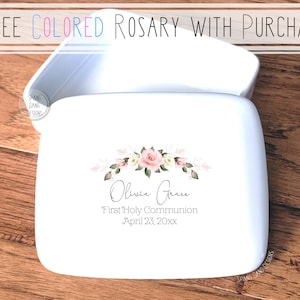 May include: White ceramic box with a floral design and the text "Olivia Grace First Holy Communion April 23, 20xx".