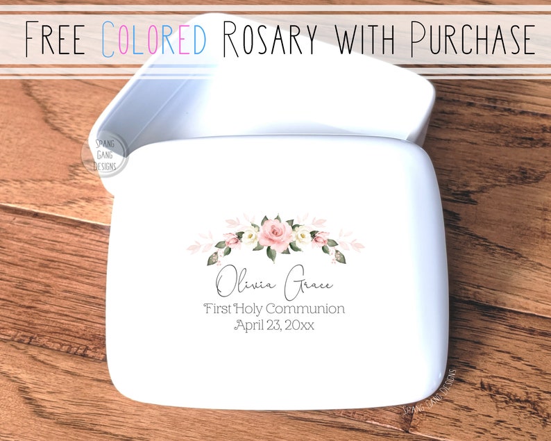 May include: White ceramic box with a floral design and the text "Olivia Grace First Holy Communion April 23, 20xx".