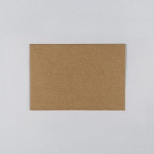 May include: A plain brown paper envelope.