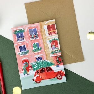 Carte double, format A6. Rue de Paris à Noël, 2CV et sapin
