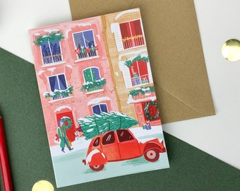 Carte double, format A6. Rue de Paris à Noël, 2CV et sapin