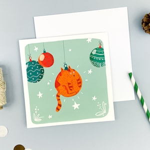 Carte de Voeux, Noël. Chat Boule de Noël