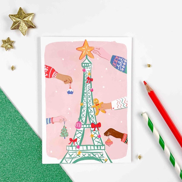 Carte de Voeux Tour Eiffel et décorations de Noël. La Tour Eiffel comme un sapin. Carte pour Noël et les fêtes de fin d'année. Noël à Paris