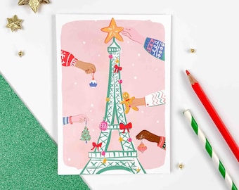 Carte de Voeux Tour Eiffel et décorations de Noël. La Tour Eiffel comme un sapin. Carte pour Noël et les fêtes de fin d'année. Noël à Paris