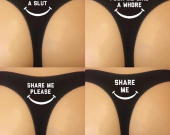 Naughty logos on the rear of the thong