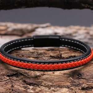 Leather bracelet men&#39;s bracelet black orange with magnetic clasp made of stainless steel