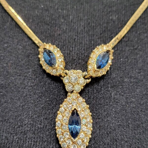 Vintage Gold tone necklace with blue and white rhinestone pendants