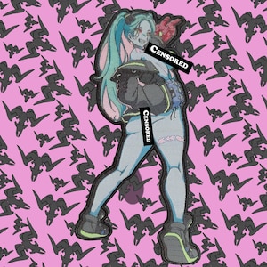 May include: An embroidered patch featuring an anime-style character with teal hair, wearing a black jacket and light blue leggings, with two black bars labeled CENSORED covering parts of the figure, set against a pink background with black shapes.