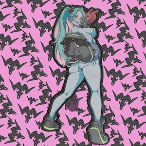 May include: Embroidered patch featuring a stylized anime-style character with blue skin, teal hair, and a black jacket. The patch has a black border and is set against a pink background with a repeating black graphic.