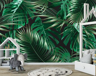 May include: A vibrant green and black tropical leaf wallpaper design. The wallpaper features large, detailed illustrations of palm and monstera leaves with gold accents. The design creates a lush, jungle-like atmosphere, suitable for interior decor.