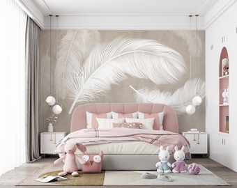 May include: A bedroom with a pink bed, white nightstands, and a large feather mural. The bed has a pink headboard and is covered with pink and white bedding. Decorative stuffed animals and a rug complete the room's decor.