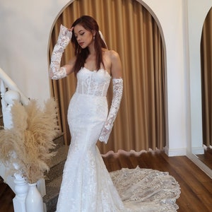 Corset fit and flare silhouette wedding dress with subtle sparkle lace for modern bride - Detachable long sleeve, beautiful long train