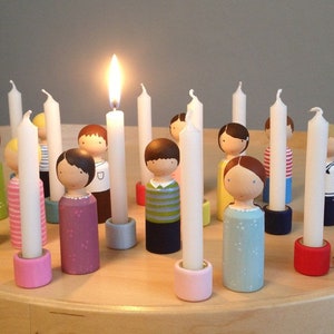 Birthday doll with birthday candle © image 1