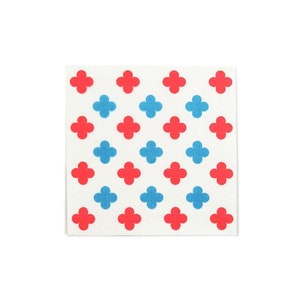 May include: A white square with a repeating pattern of red and blue four-leaf clover shapes.
