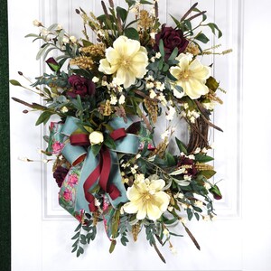 This beautiful wreath filled with cream magnolias and burgundy roses will add a southern touch to your deco. Housewarming gift, Gift for Mom