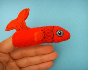 Fingerpuppe roter Fisch