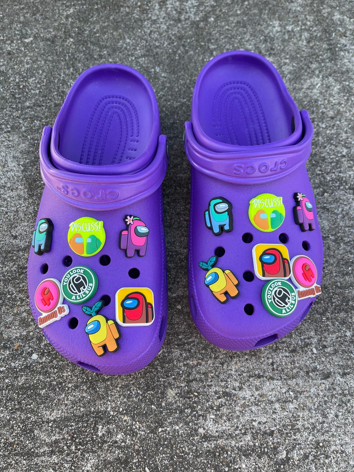 what stores sell charms for crocs