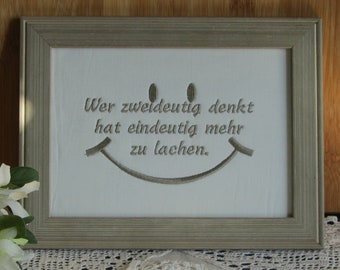 Borduurwerk afbeelding slogan