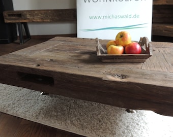 Coffee table Coffee table made of old oak, half-timbered beams cut open