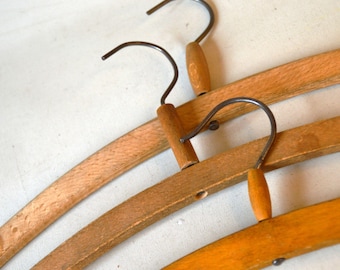 3 vintage clothes hangers, L