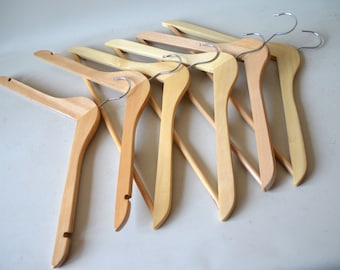 6 wooden coat hangers, sturdy wooden coat hangers, trouser hangers. E