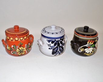 old jugs or cans hand-painted from the Sudetenland,