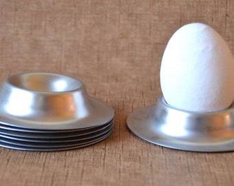 7 old stackable egg cups in aluminum