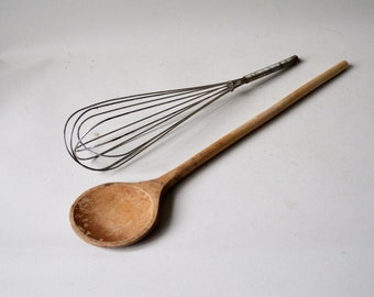 big old wooden spoon and old whisk