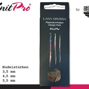 May include: A black package featuring three knitting needles with colorful shafts. The package includes the Knit Pro and Lana Grossa logos, and the text "Reparatunrhaken Design-Holz." The sizes are 3.5 mm, 4.5 mm, and 5.5 mm.